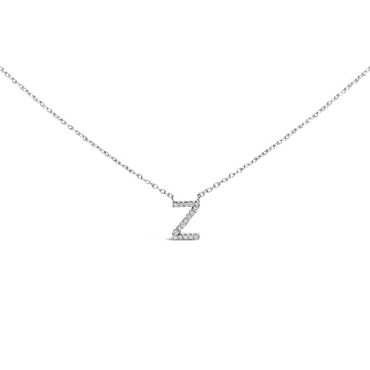 Close-up front view of a white necklace chain with a pendant in the shape of the letter Z, adorned with multiple small white gemstones in a micro-pave setting, shown on a white background.