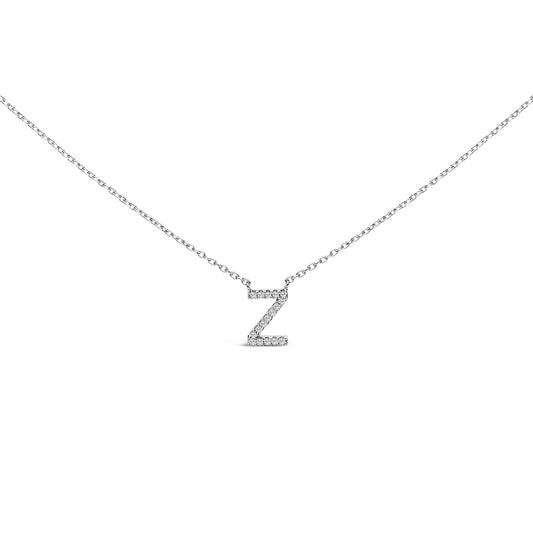 Close-up front view of a white necklace chain with a pendant in the shape of the letter Z, adorned with multiple small white gemstones in a micro-pave setting, shown on a white background.