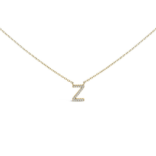Close-up front view of a yellow necklace with a pendant shaped like the letter Z, adorned with small round white gemstones in a micro-pave setting.