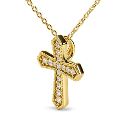 Close-up front angle of a yellow metal cross-shaped necklace pendant adorned with round white gemstones in a pave setting, shown on a chain against a white background.