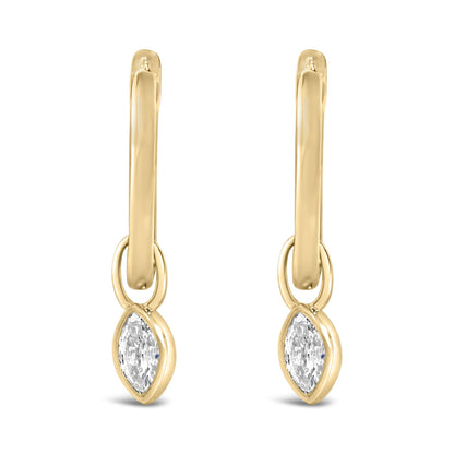 Close-up front view of yellow metal drop earrings with oval links and bezel-set marquise-shaped white gemstones at the bottom.