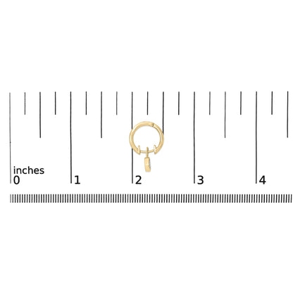 Close-up front view of a yellow metal hoop earring with a small dangling charm featuring two white marquise-shaped gemstones in bezel settings, shown on a ruler scale.