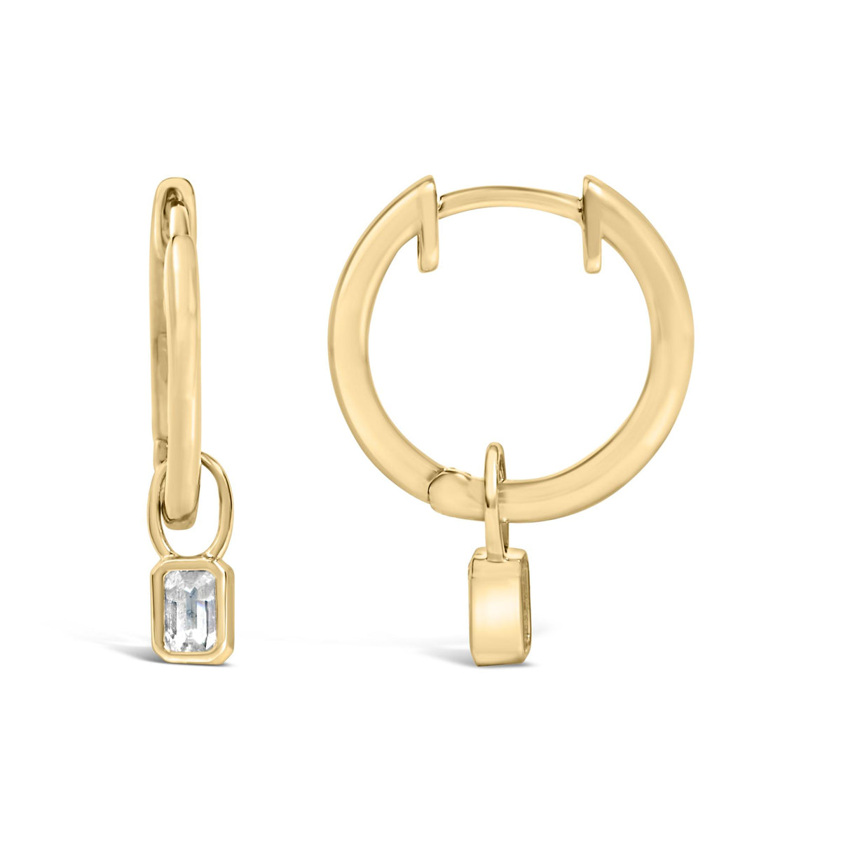 Close-up front and side view of yellow hoop earrings with a dangling emerald-shaped white gemstone in bezel setting.