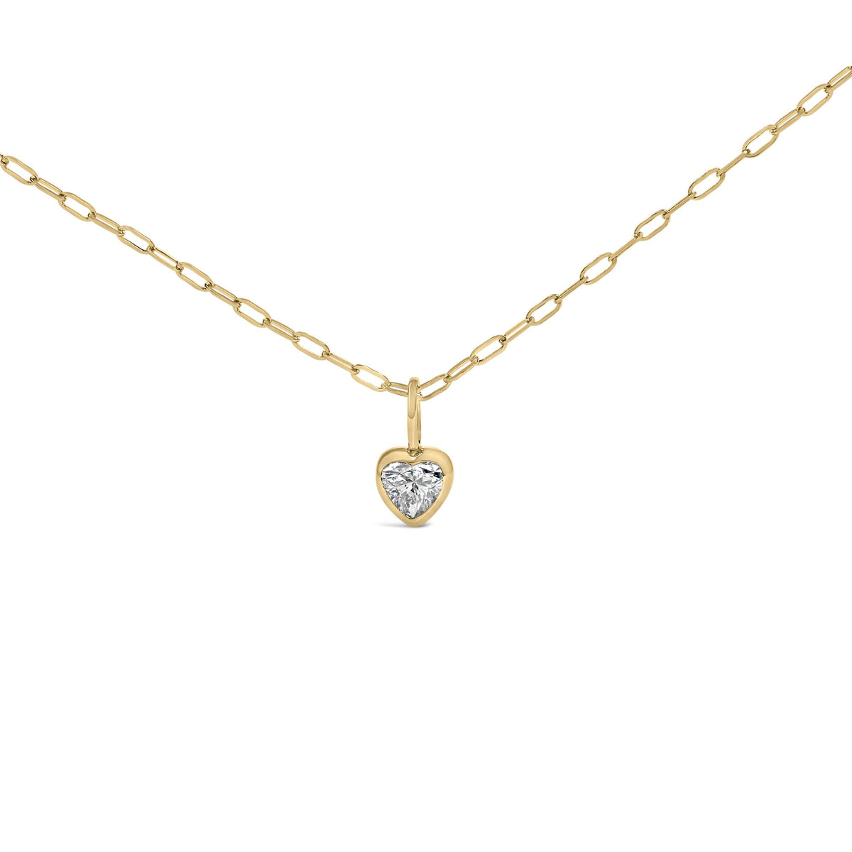 Close-up front view of a yellow necklace chain with a heart-shaped pendant featuring a white gemstone in a bezel setting.