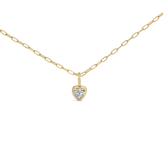 Close-up front view of a yellow necklace chain with a heart-shaped pendant featuring a white gemstone in a bezel setting.