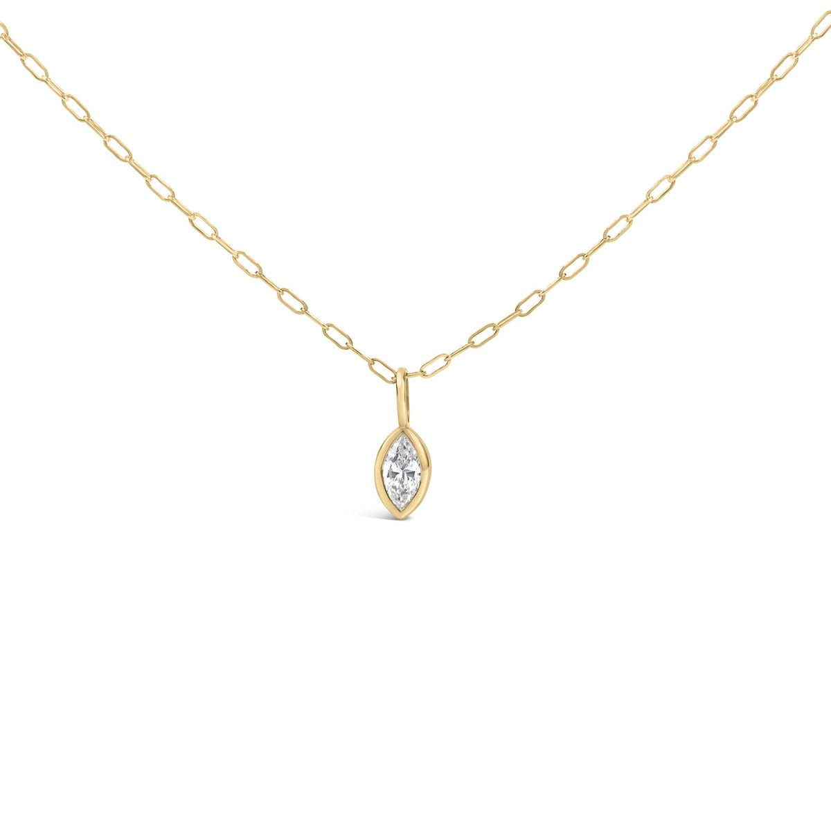 Close-up front view of a yellow metal necklace with a chain link design and a marquise-shaped white gemstone in a bezel setting pendant.