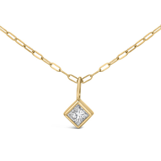 Close-up front view of a yellow metal necklace with a pendant featuring a princess-shaped white gemstone in a bezel setting.