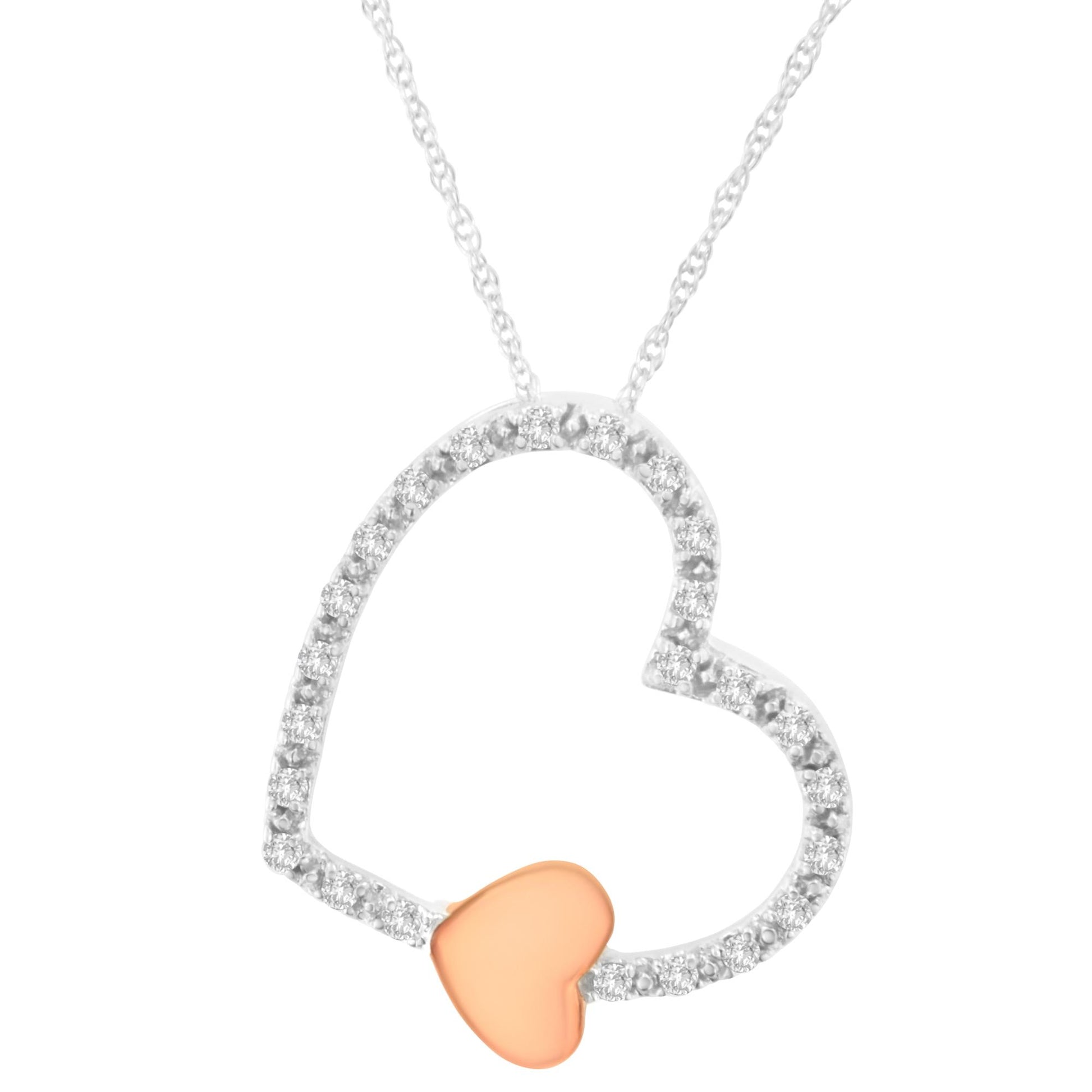 Close-up front view of a heart-shaped necklace pendant with a white metal open heart accented with small brownish round gemstones in a micro-pave setting, and a smaller solid rose-colored heart attached at the bottom.