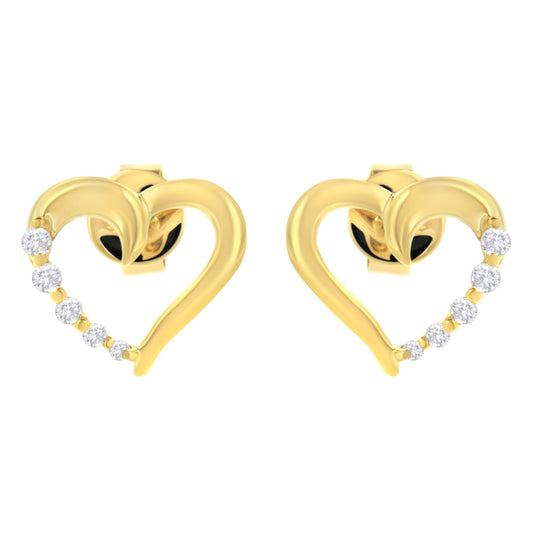 Pair of yellow metal heart-shaped earrings with a curve of small white gemstones along one side, shown from the front angle.