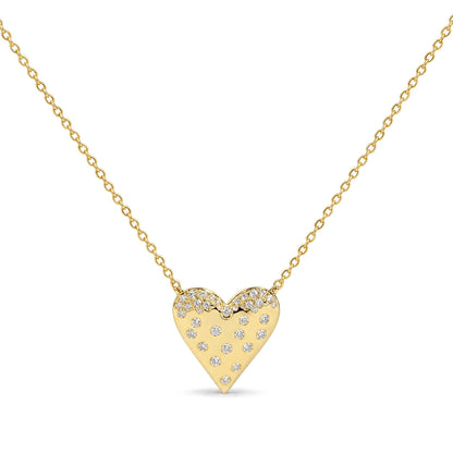 Close-up front view of a yellow metal heart-shaped necklace pendant adorned with small white gemstones in a pave setting, hanging from a delicate yellow metal chain.