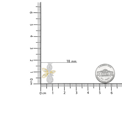 Close-up of a yellow and white metal butterfly-shaped necklace pendant with white round gemstones in prong settings, displayed on a ruler and next to a coin for size reference, shot from the front.