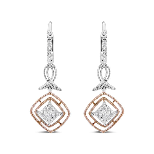 Front view of white and rose metal dangle earrings with round and princess shape white gemstones in prong settings.