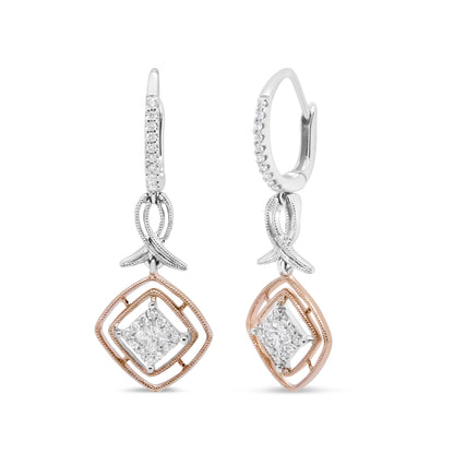 Front-facing shot of a pair of white and rose metal drop earrings with round white gemstones along the hoop, a silver twisted ribbon detail, and a rose geometric frame holding a princess-shaped white gemstone in the center.