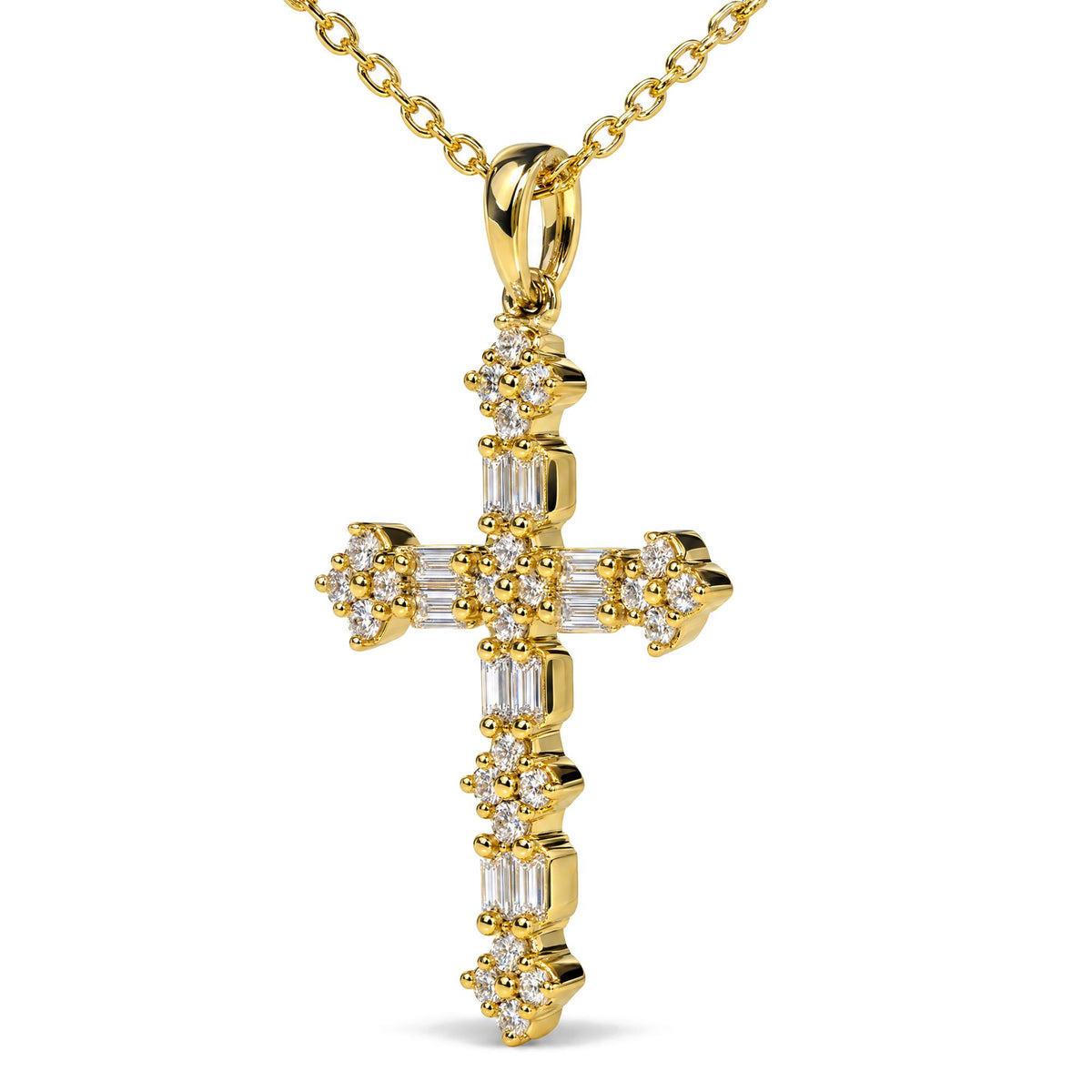 Close-up front view of a yellow metal cross-shaped necklace pendant adorned with round and baguette white gemstones, shown on a chain.