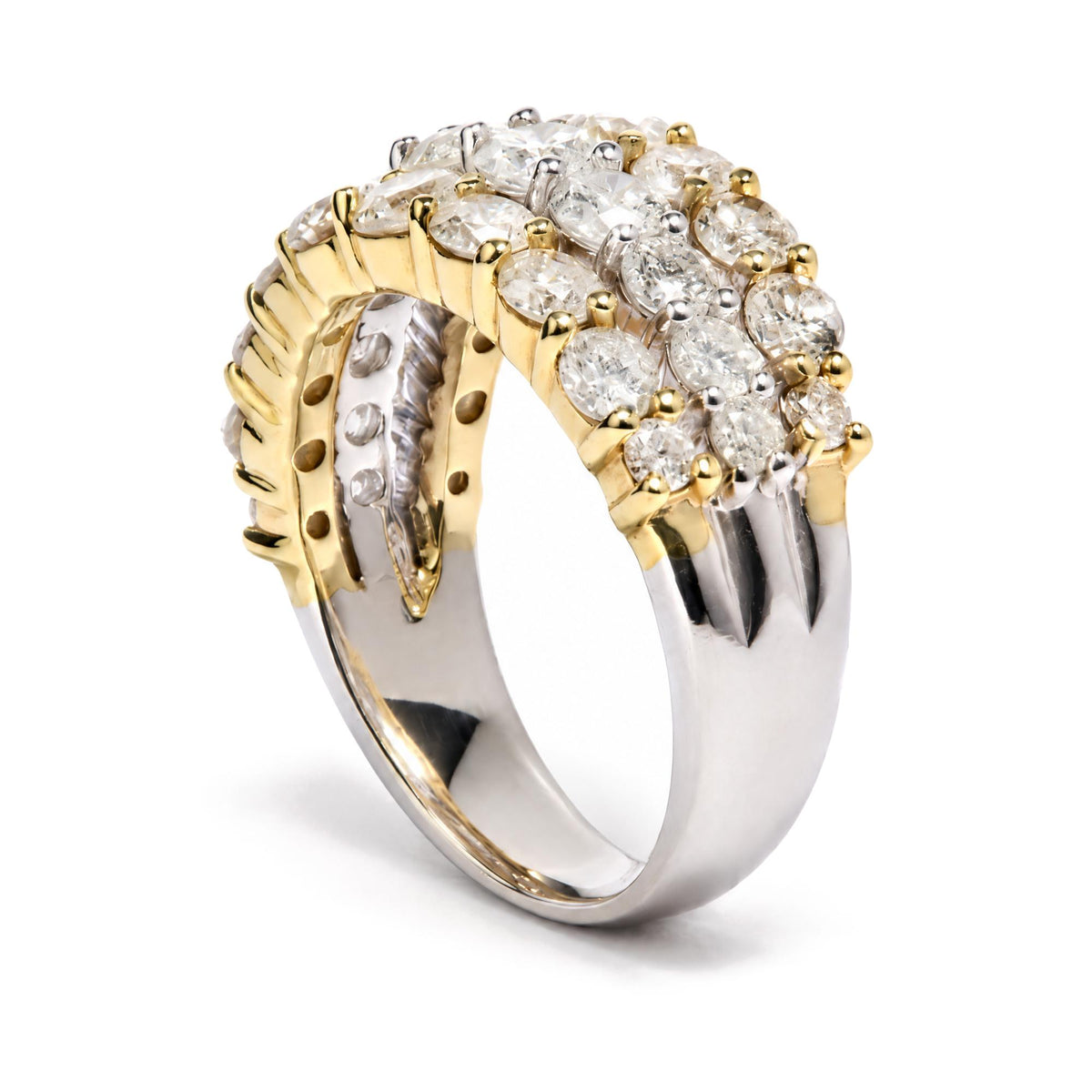 Close-up image of two rings with yellow and white metal bands, featuring multiple round white gemstones in prong settings, shown from a slight side angle.