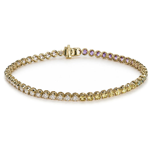 Top view of a 14K yellow gold ombré multicolor sapphire and diamond tennis bracelet with round prong-set gemstones on white