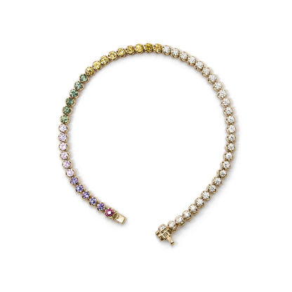 Yellow metal bracelet shown flat in a top-down view, featuring round white gemstones and round yellow, green, pink, and purple gemstones in prong settings along the entire length.