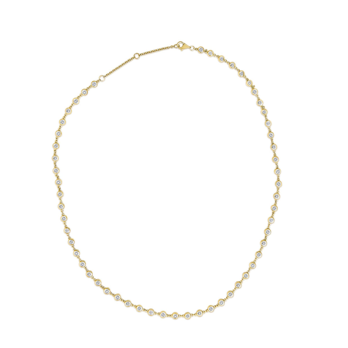 Close-up top view of a yellow metal necklace with round white gemstones in bezel settings along the chain, shown on a white background.