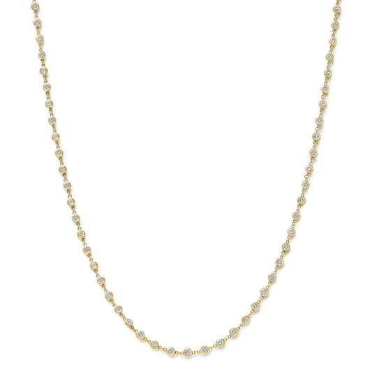 Close-up front view of a yellow necklace featuring round white gemstones in bezel settings linked together.