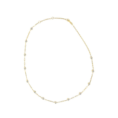 Yellow necklace with chain links and white round gemstones in bezel settings, shown from a top view on a white background.