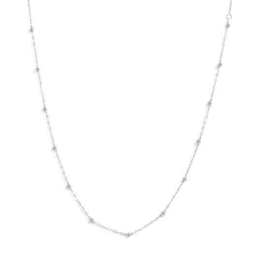 Close-up front view of a white necklace chain featuring round bezel-set white gemstones evenly spaced along the chain, shown on a white background.