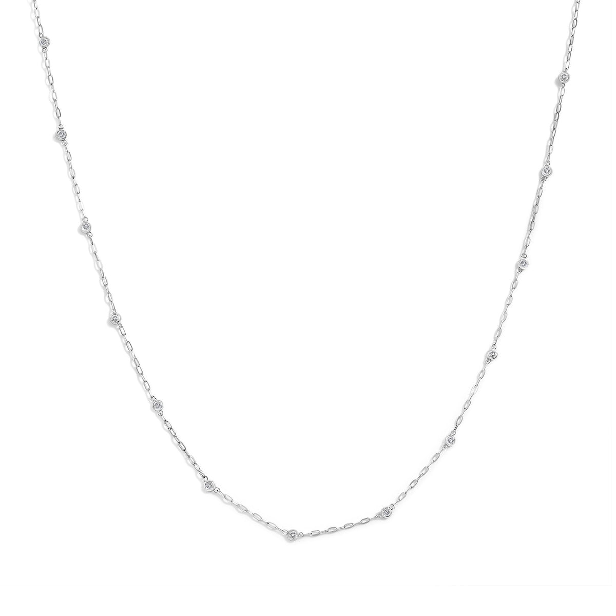 Close-up front view of a white necklace chain featuring multiple bezel-set round white gemstones evenly spaced along the chain, shown on a white background.
