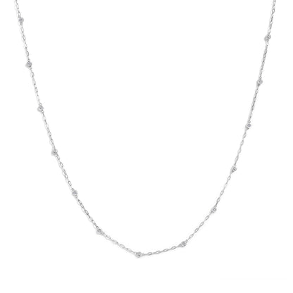 Close-up front view of a white necklace chain featuring multiple bezel-set round white gemstones evenly spaced along the chain, shown on a white background.