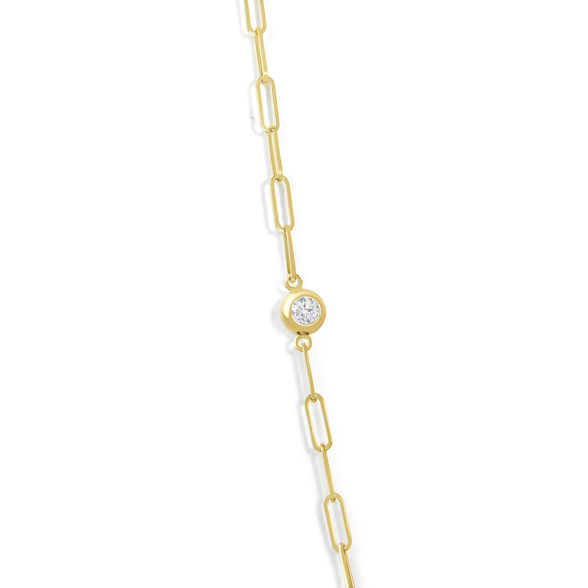 Close-up image of a yellow necklace chain with elongated links and a round white gemstone bezel pendant, shown from a front angle on a white background.