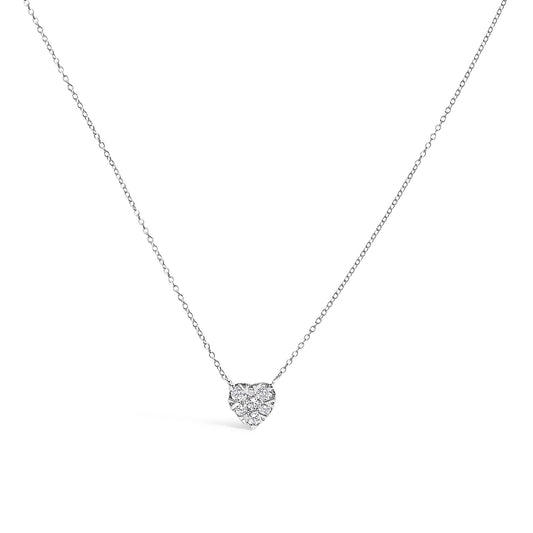 Close-up front view of a white necklace with a heart-shaped pendant featuring multiple round white gemstones in an invisible setting on a fine chain.