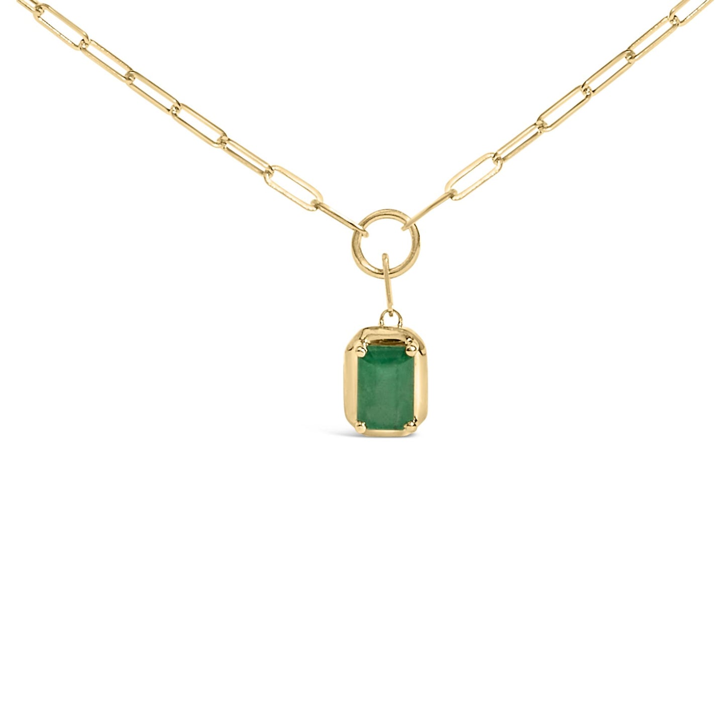 Close-up front angle of a yellow metal necklace with a rectangular green gemstone pendant in a bezel setting, shown against a white background.