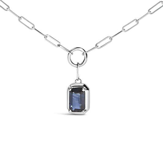 White necklace with a rectangular blue gemstone pendant in a bezel setting, shown in a close-up front view.
