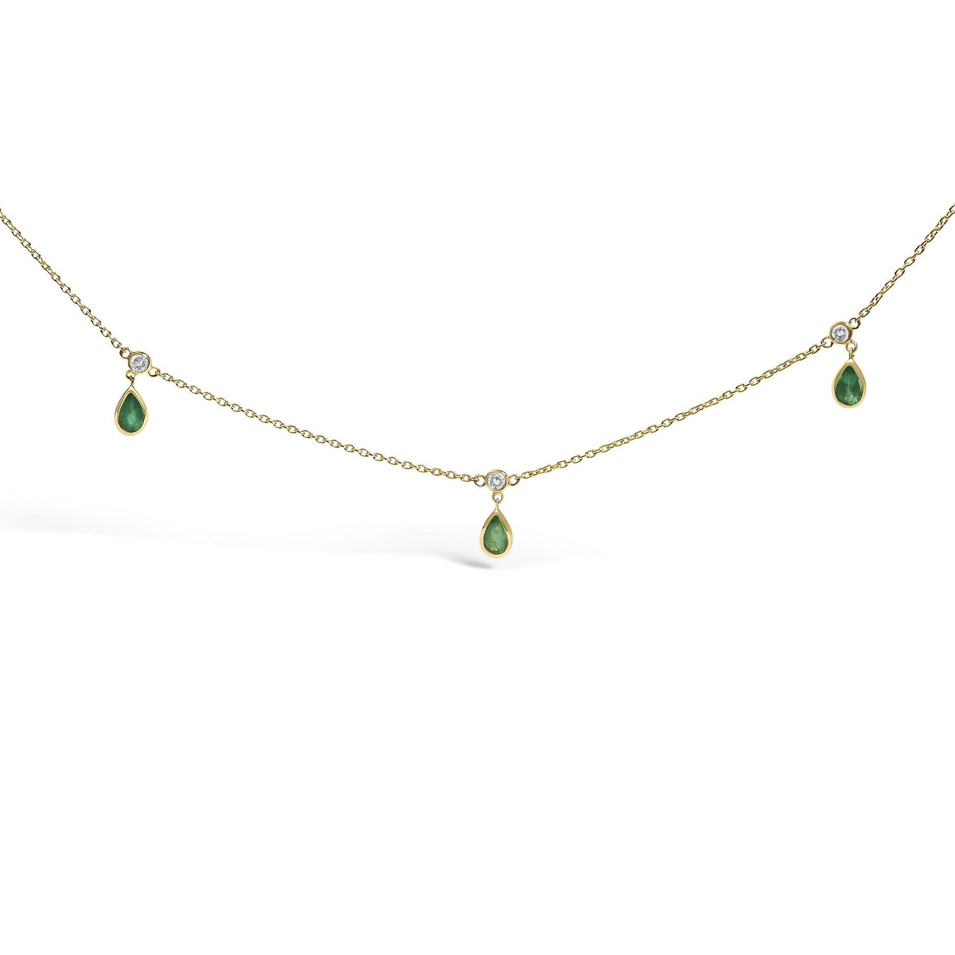 Front-facing close-up of a yellow necklace chain featuring alternating white round gemstones and green pear-shaped gemstones in bezel settings.