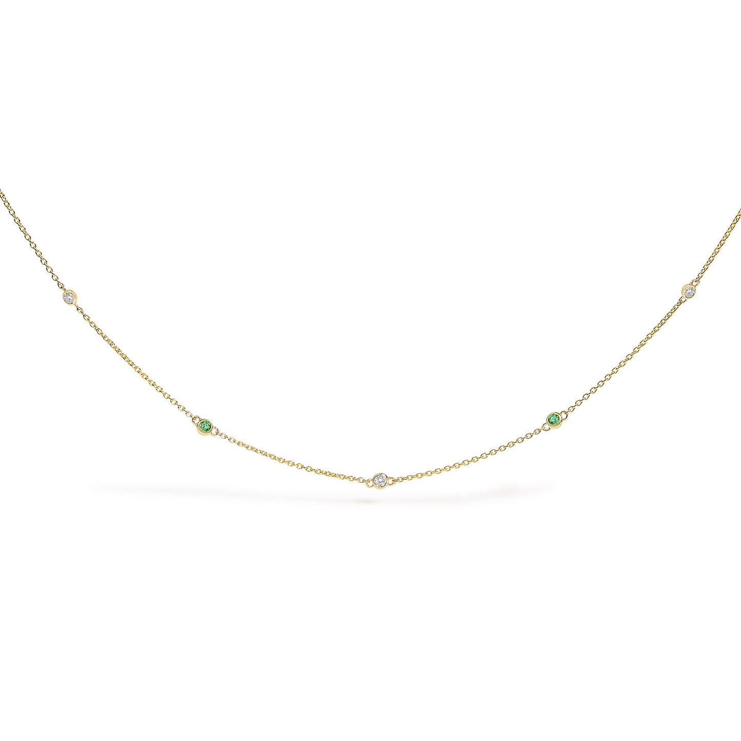 Yellow necklace with alternating round white and green gemstones in bezel settings, shown flat on a white background from a front angle.
