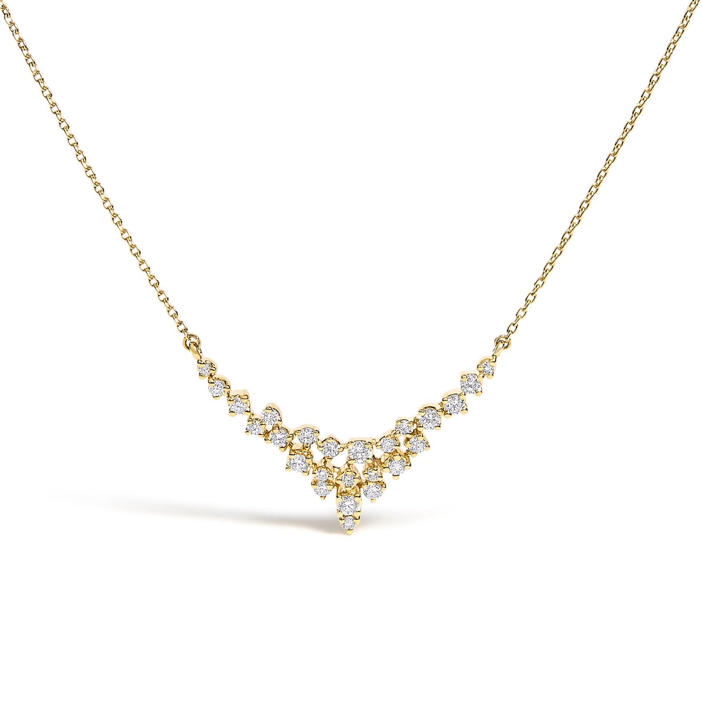 Front-facing close-up of a yellow metal necklace with a V-shaped cluster of round white gemstones in prong settings.