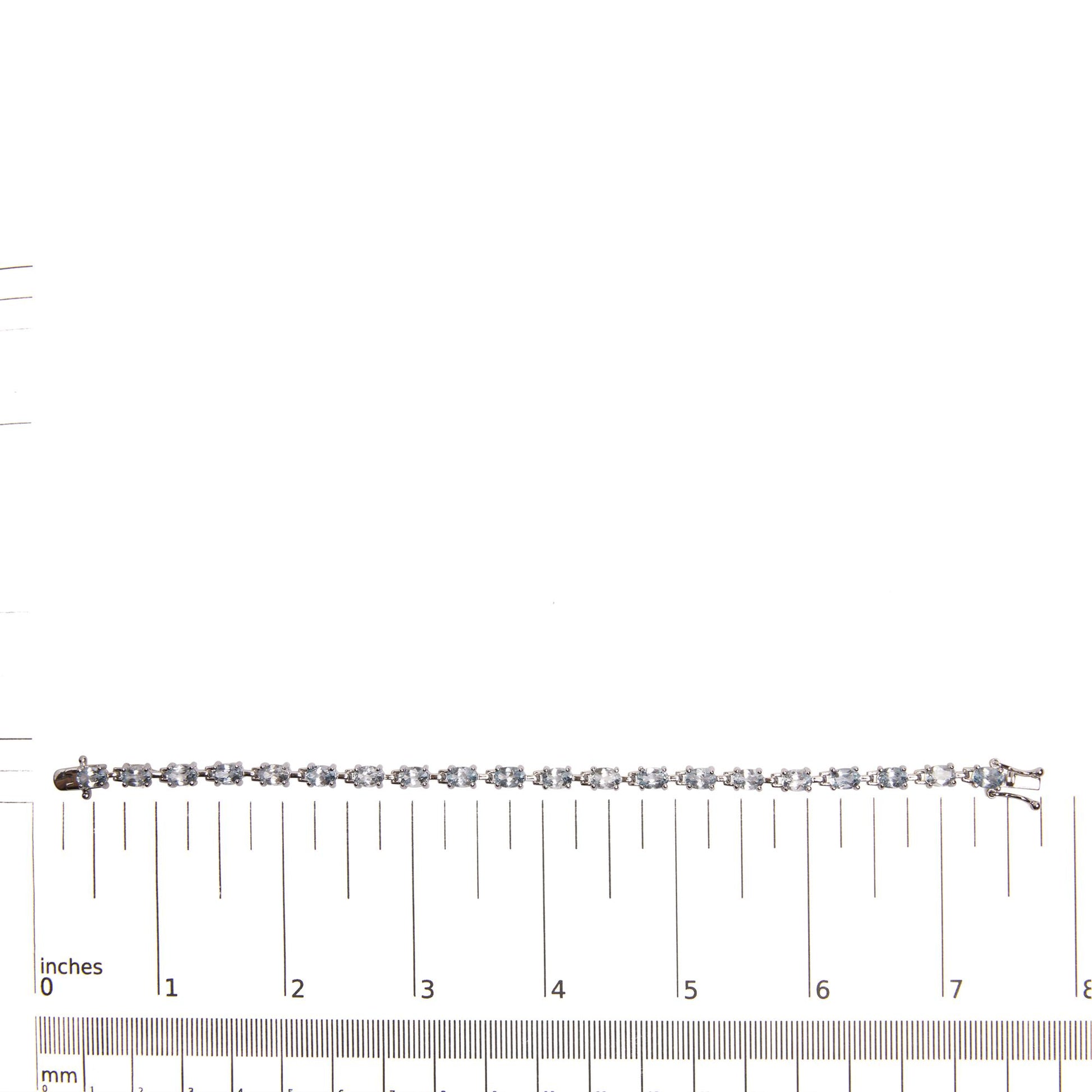 .925 Sterling Silver 11.0 Cttw Oval Shaped Created Light Blue Topaz Link Bracelet - 7 inch