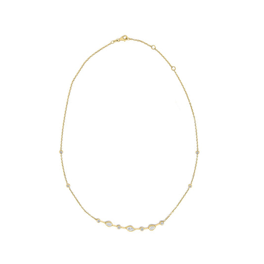Front view of 18K yellow gold bezel-set station necklace with round, pear and marquise diamonds on white background