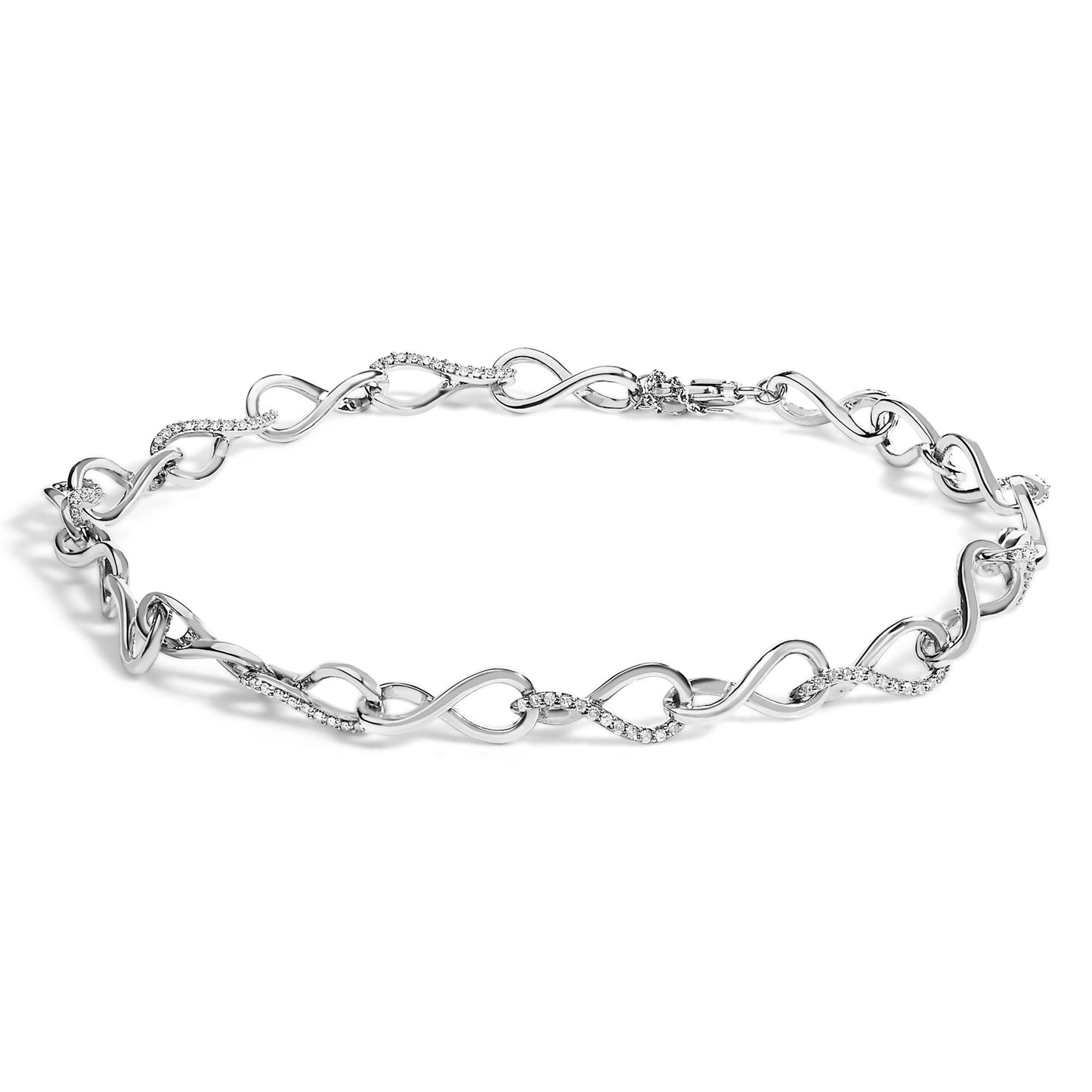 White metal bracelet with alternating twisted infinity loop links, some adorned with small white gemstones in prong settings, shown from a top flat angle.