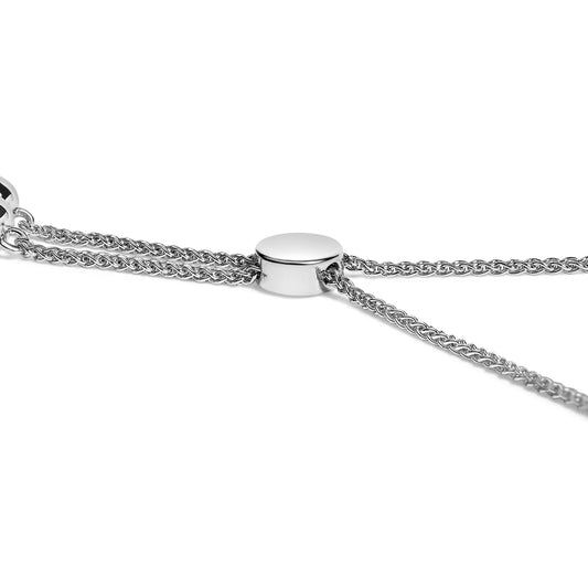 Close-up angled view of a white metal bracelet with a smooth cylindrical clasp and intertwined chain links shown against a white background.