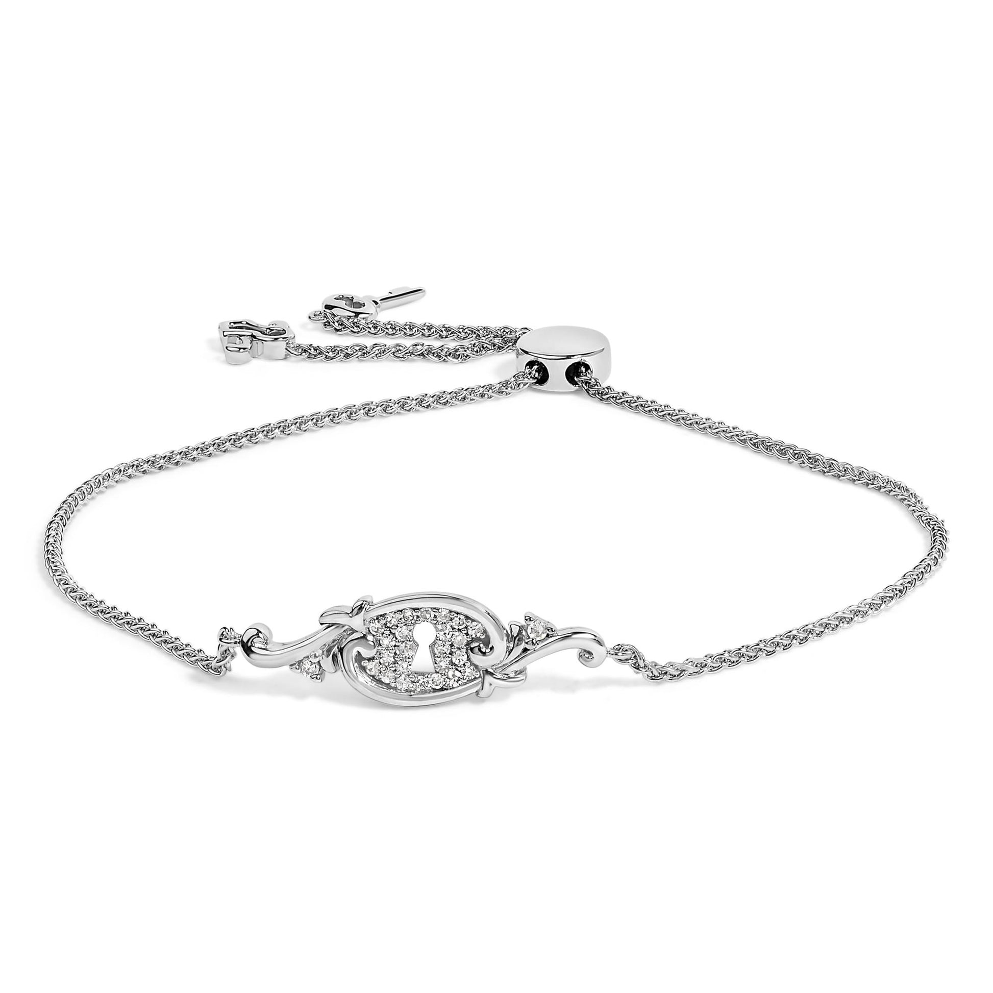 White metal bracelet shown from a front angle with an oval centerpiece featuring a keyhole design surrounded by small round white gemstones in a shared prong setting and a delicate twisted chain with adjustable slider closure.