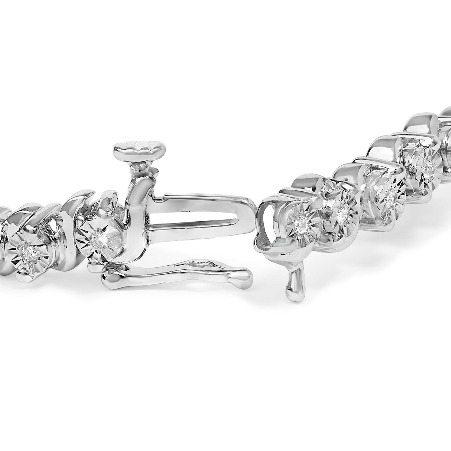 Close-up front angle of a white bracelet with round white gemstones in miracle settings, showing the clasp open.