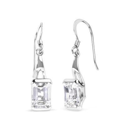 Front and side view of white metal earrings with rectangular white gemstones in four-prong settings, shown against a white background.