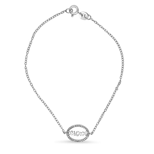 White metal bracelet with an oval centerpiece featuring the word 'mom' in script, surrounded by white round prong-set gemstones, shown from the top angle on a white background.