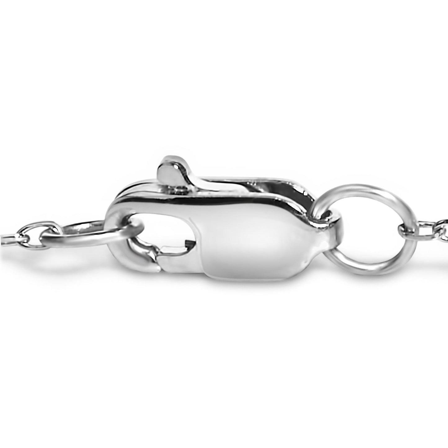 Close-up side angle of a white metal bracelet clasp with a chain attachment, no gemstones visible.
