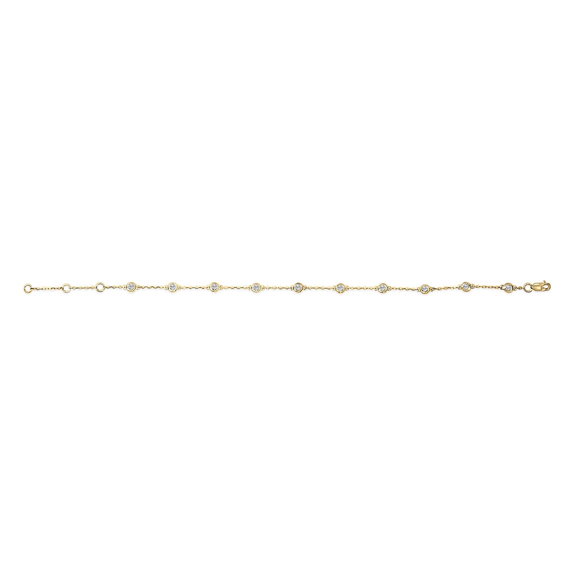 Yellow metal bracelet with evenly spaced round white gemstones in bezel settings, shown flat from a top-down angle.