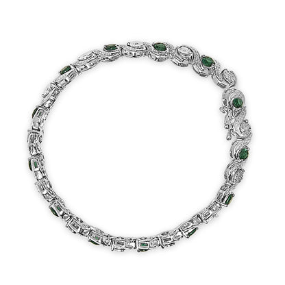 Top-down view of a white metal bracelet set with round white gemstones in a miracle setting and round green gemstones in a prong setting, arranged in a linked design.
