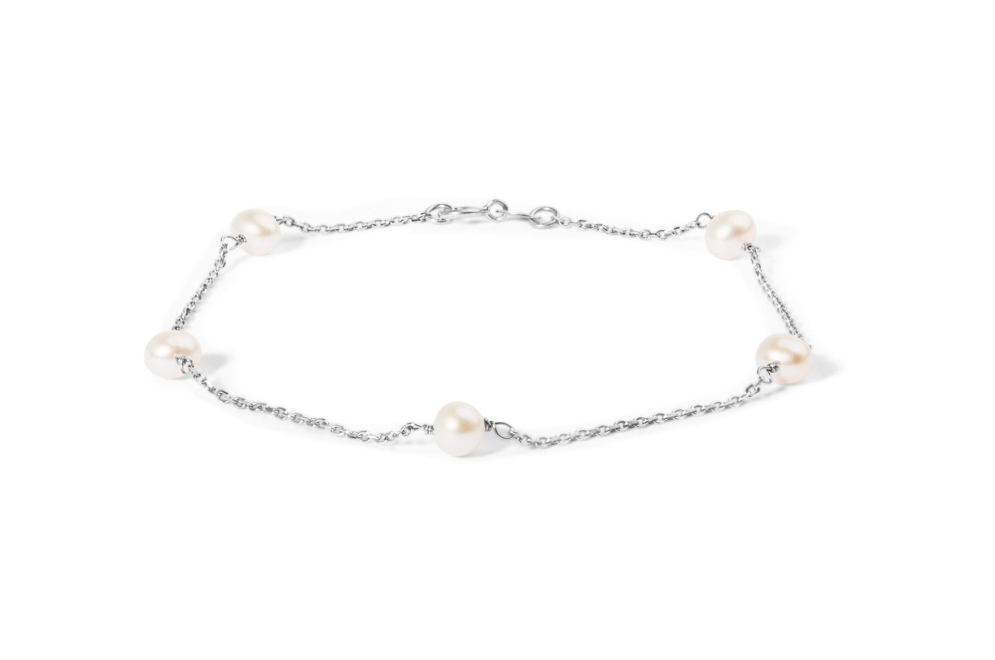 White metal chain bracelet with evenly spaced white gemstones, shown flat from a top-down angle on a white background.