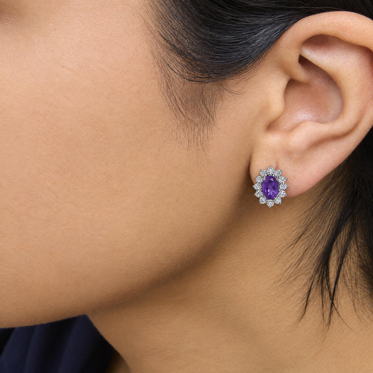 Sterling Silver 1/8 Cttw Diamond Starburst Oval Amethyst Stud Earrings