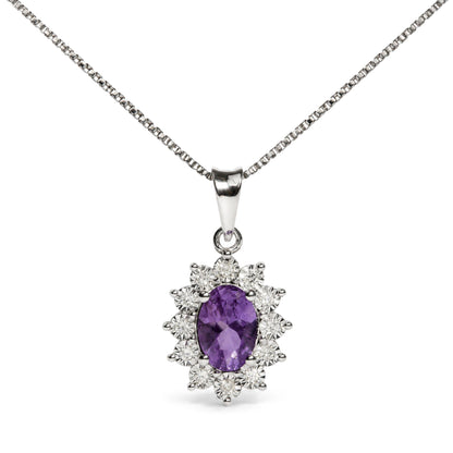 Close-up front view of a white metal necklace with an oval purple gemstone pendant surrounded by round white gemstones in a floral cluster design shown on a white background.