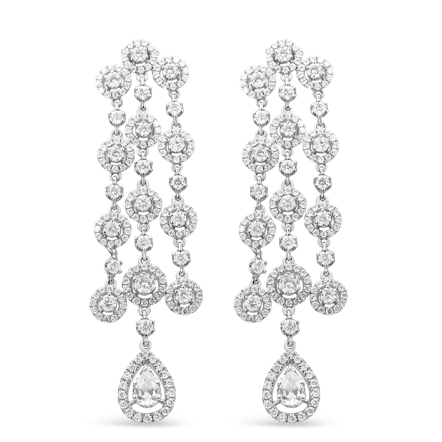 Front view of a pair of white metal chandelier earrings featuring multiple round white gemstones in prong and pave settings and a pear-shaped white gemstone at the bottom.