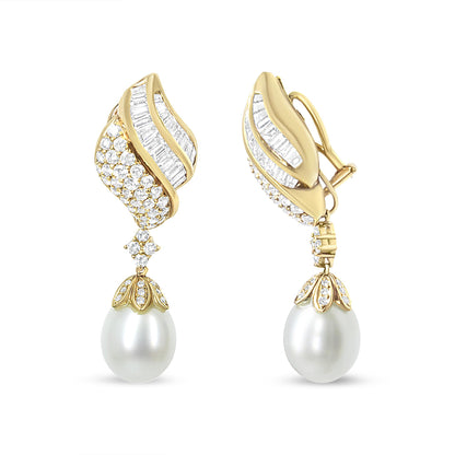Front and side view of yellow metal drop earrings with white gemstones in baguette and round shapes, featuring round white gemstone dangles resembling pearls.